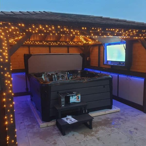 permanent hot tubs like the installation here are a better investment