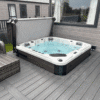 Oasis Range Hot Tub 13AMP. 2 loungers 3 seats. Hot tub sunk into decking